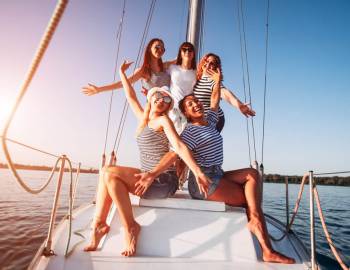 A bachelorette party enjoying themselves on a boat off of Hilton Head Island