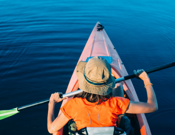 Man kayaking on the ocean