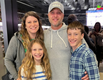 Joshua Mann and his family at a hockey game for the Military Appreciation Vacation Giveaway