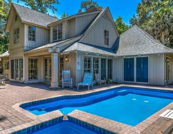 Large house behind pool