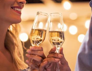 new years eve couple with champagne flutes 