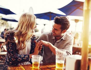 A couple dining outdoors at a restaurant on Hilton Head Island