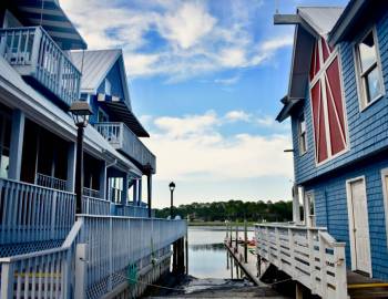 A view of the water in between shops and restaurants at South Beach Marina