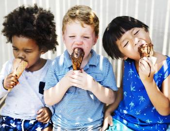 cute kids enjoying ice cream in the summer messy 