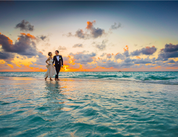Couple on beach after wedding