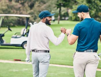 two men on golf course 