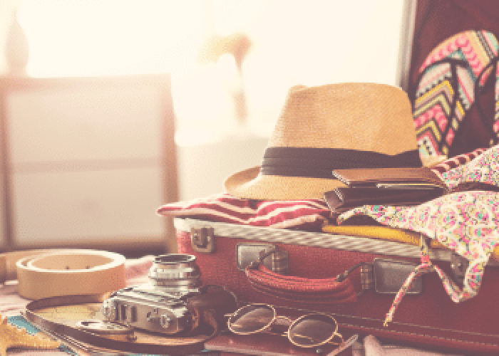 packing for the beach summer suitcase