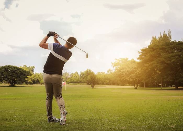 man playing golf