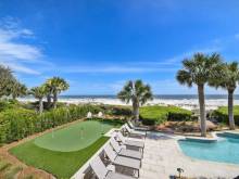 A beachside pool and putting green at a vacation rental home given away as part of a military appreciation giveaway