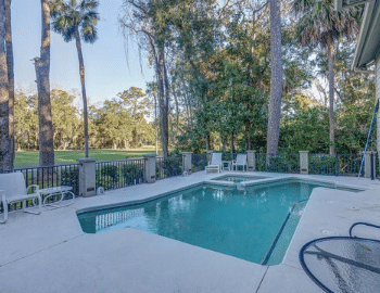 beach properties pool and golf course view